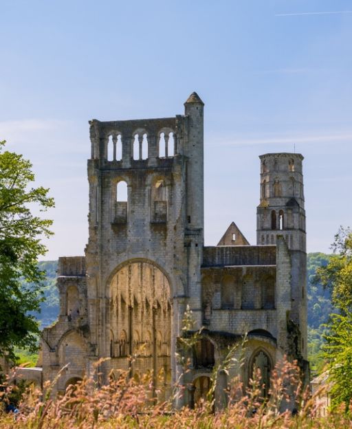 The ruined towers of Jumièges Abbey rising above the Seine valley in Normandy, France