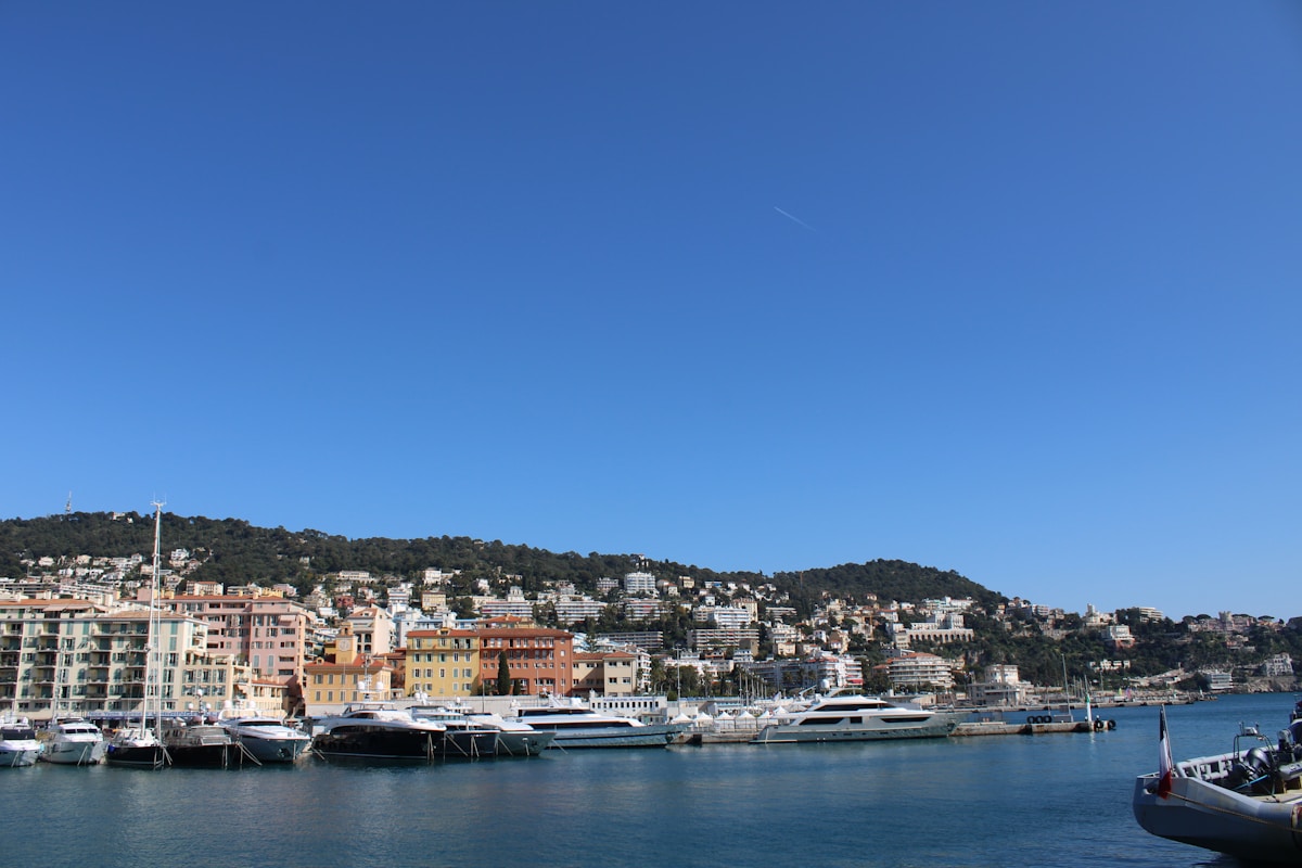 Nice France port with colourful buildings and yachts on the French Riviera