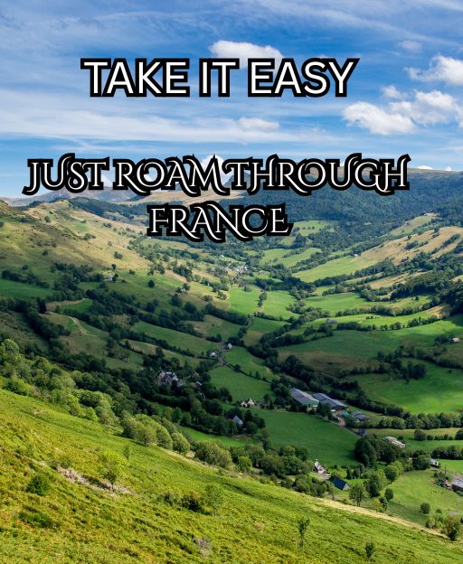 The Auvergne volcanic valley in central France, with rolling green puys stretching across the Massif Central
