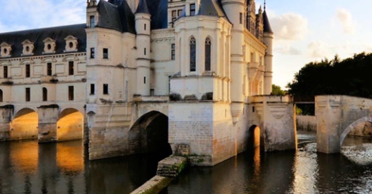 Château de Chenonceau spanning the River Cher in the Loire Valley, France, at golden hour