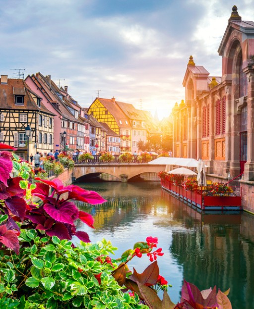 Petite Venise canal district in Colmar, Alsace, France with colourful half-timbered houses reflected in the water