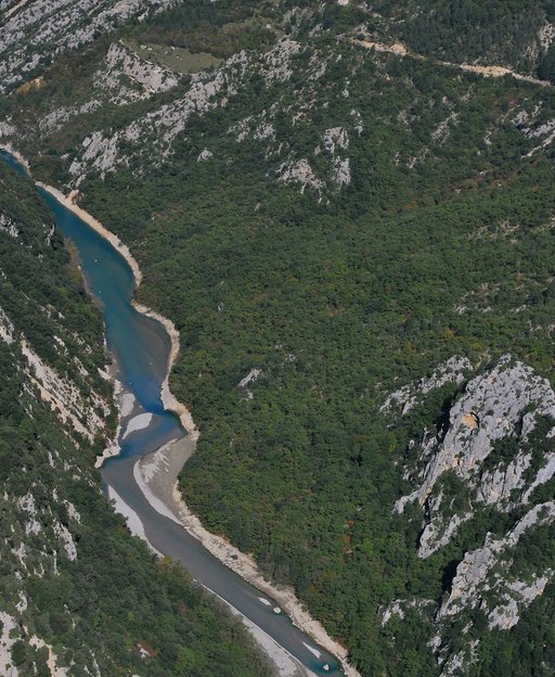 Aerial view of the Gorges de l'Ardeche river winding through limestone cliffs in southern France