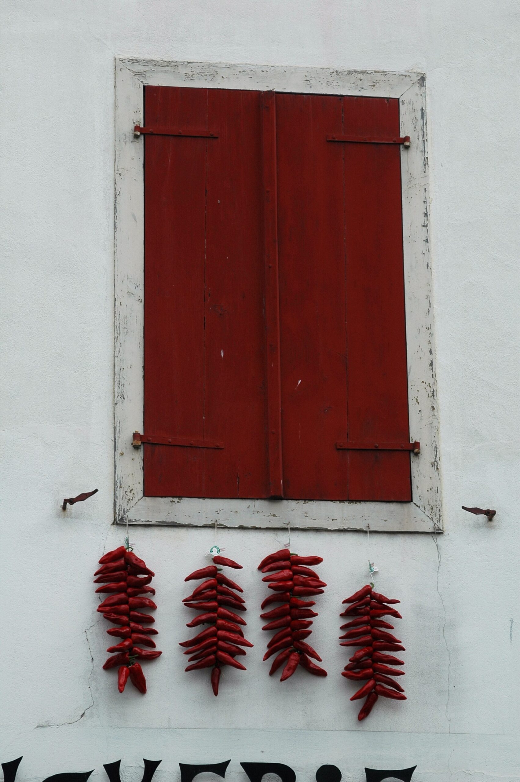 The French Village That Drapes Red Peppers from Every Window in October