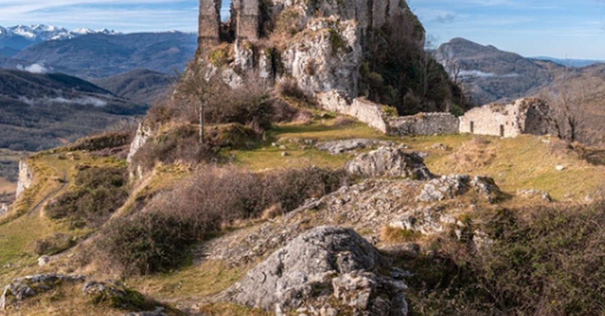 Ruins of Château de Roquefixade, a Cathar castle on a rocky cliff in Ariège, southern France