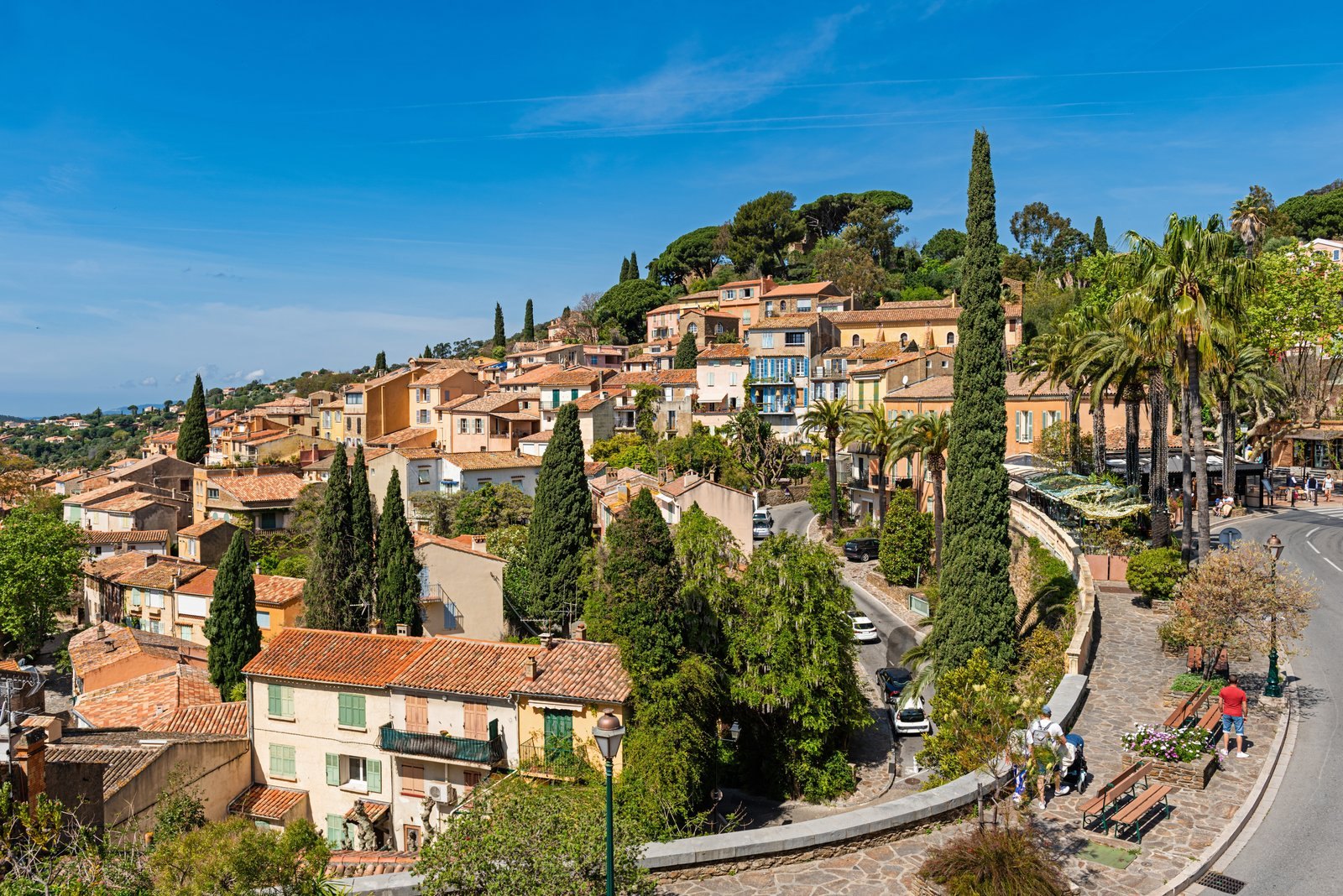 Bormes-les-Mimosas village with palms and cypress trees on the Var coast