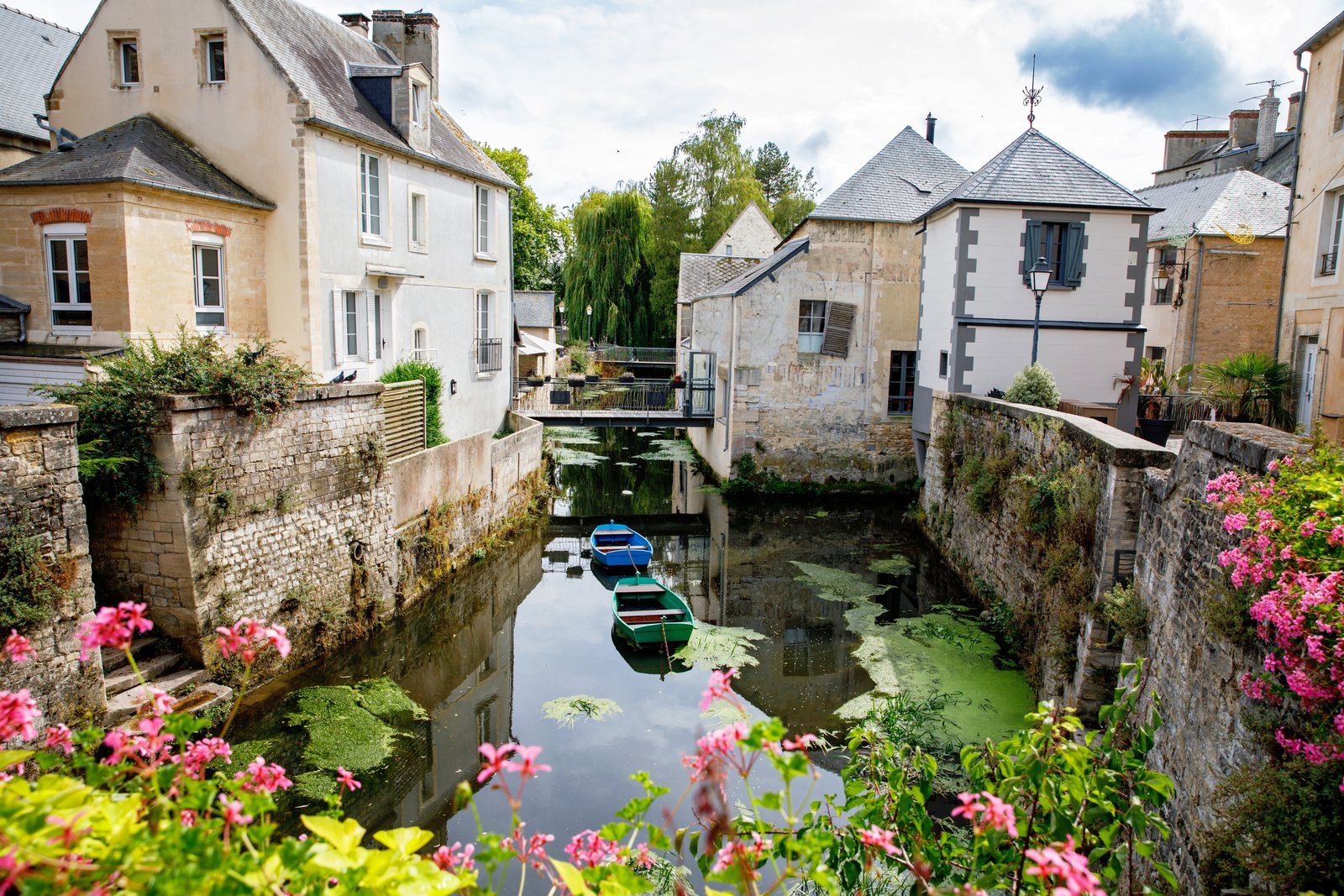 Old houses along the River Aure in the centre of Bayeux, Normandy
