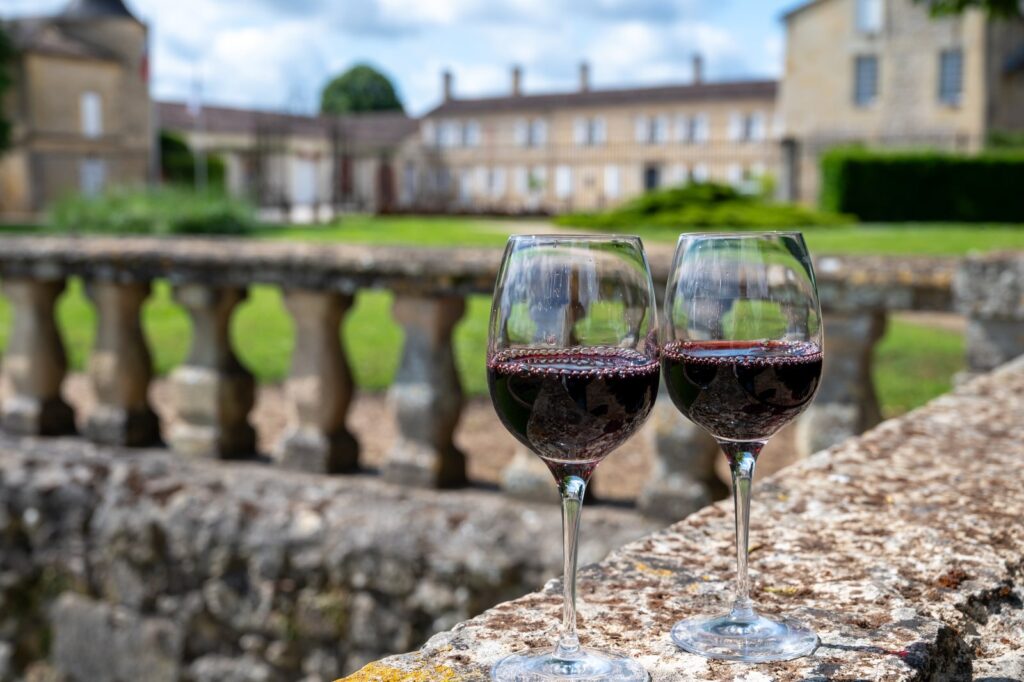 Glasses of red wine at a château in Portets, Graves, Bordeaux