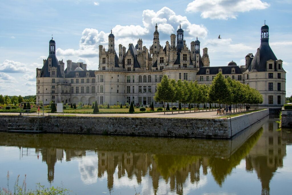 Château de Chambord reflected in the water, Loire Valley