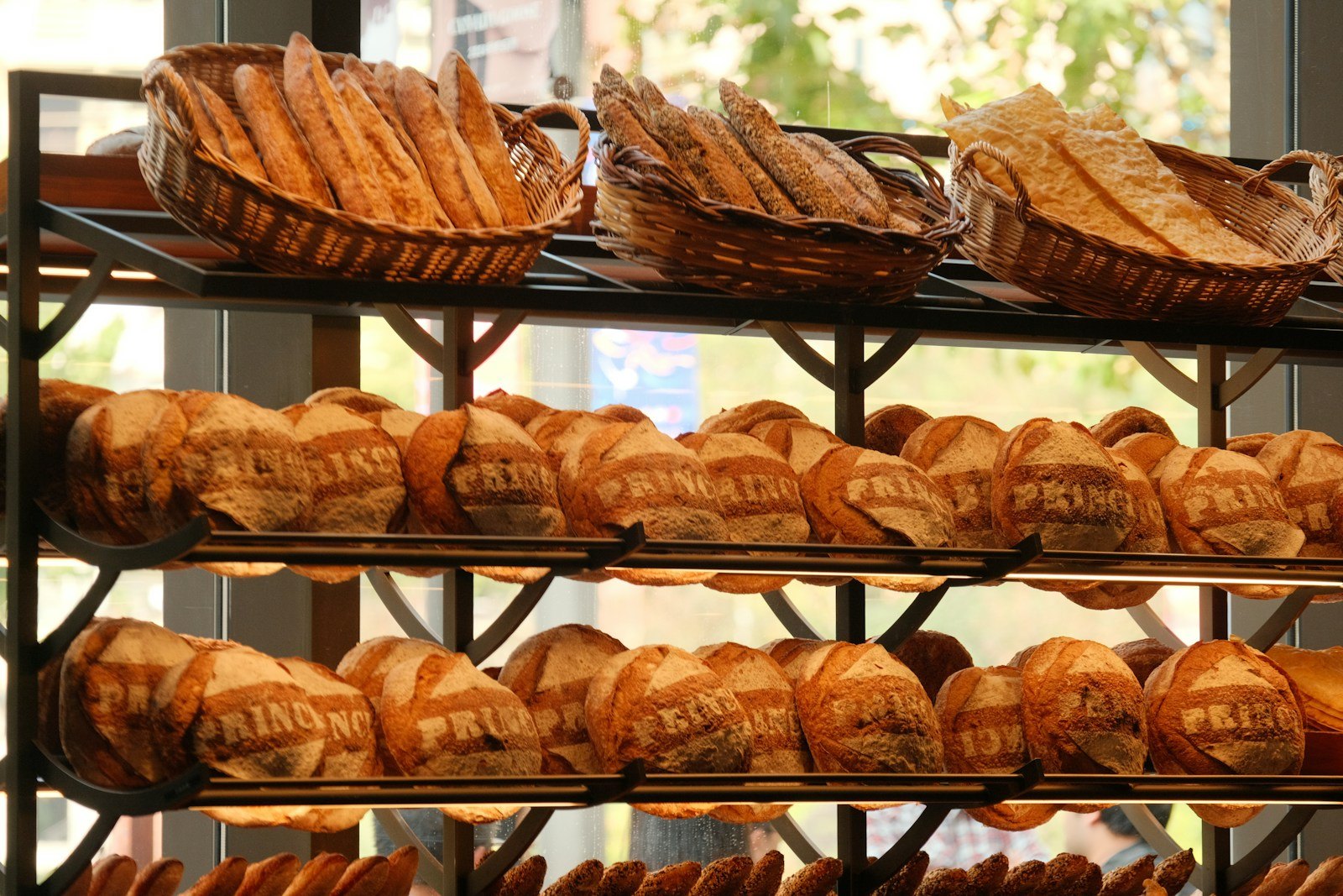 Loaves of bread on bakery racks